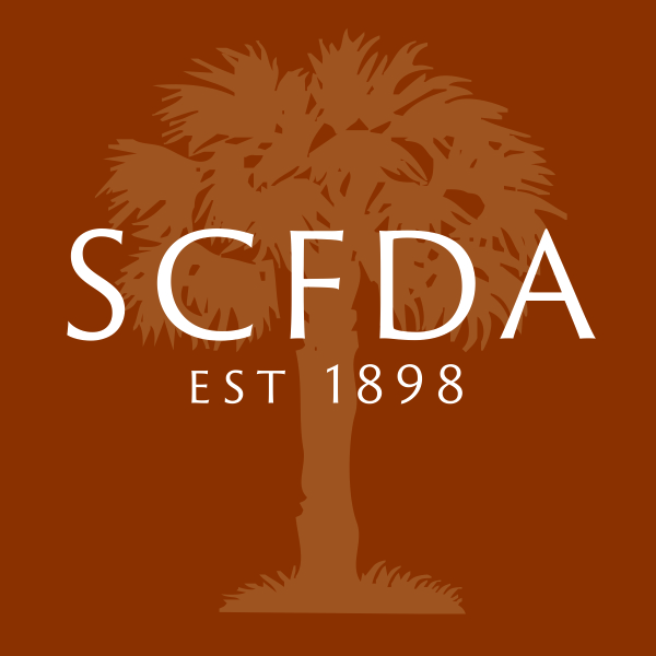 South Carolina Funeral Directors Association Established 1898. Palm tree on brown